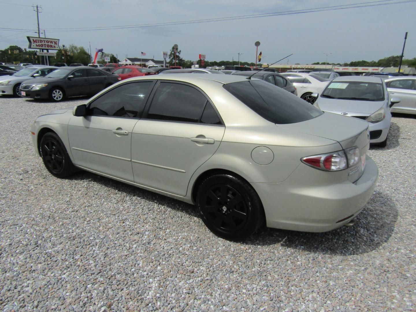 2006 Gold /Tan Mazda MAZDA6 i Sports Sedan (1YVFP80C465) with an 2.3L L4 DOHC 16V engine, Automatic transmission, located at 15016 S Hwy 231, Midland City, AL, 36350, (334) 983-3001, 31.306210, -85.495277 - Photo#5